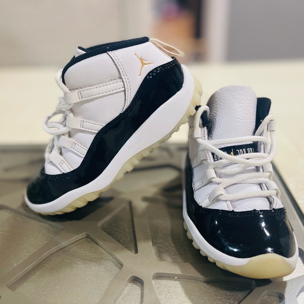 Jordan Kids Sneakers in Black, White, and Gold